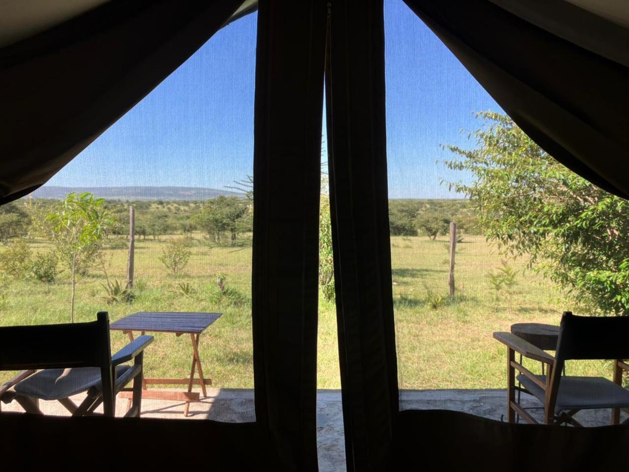 Отель Kambu Mara Camp Sekenani Экстерьер фото